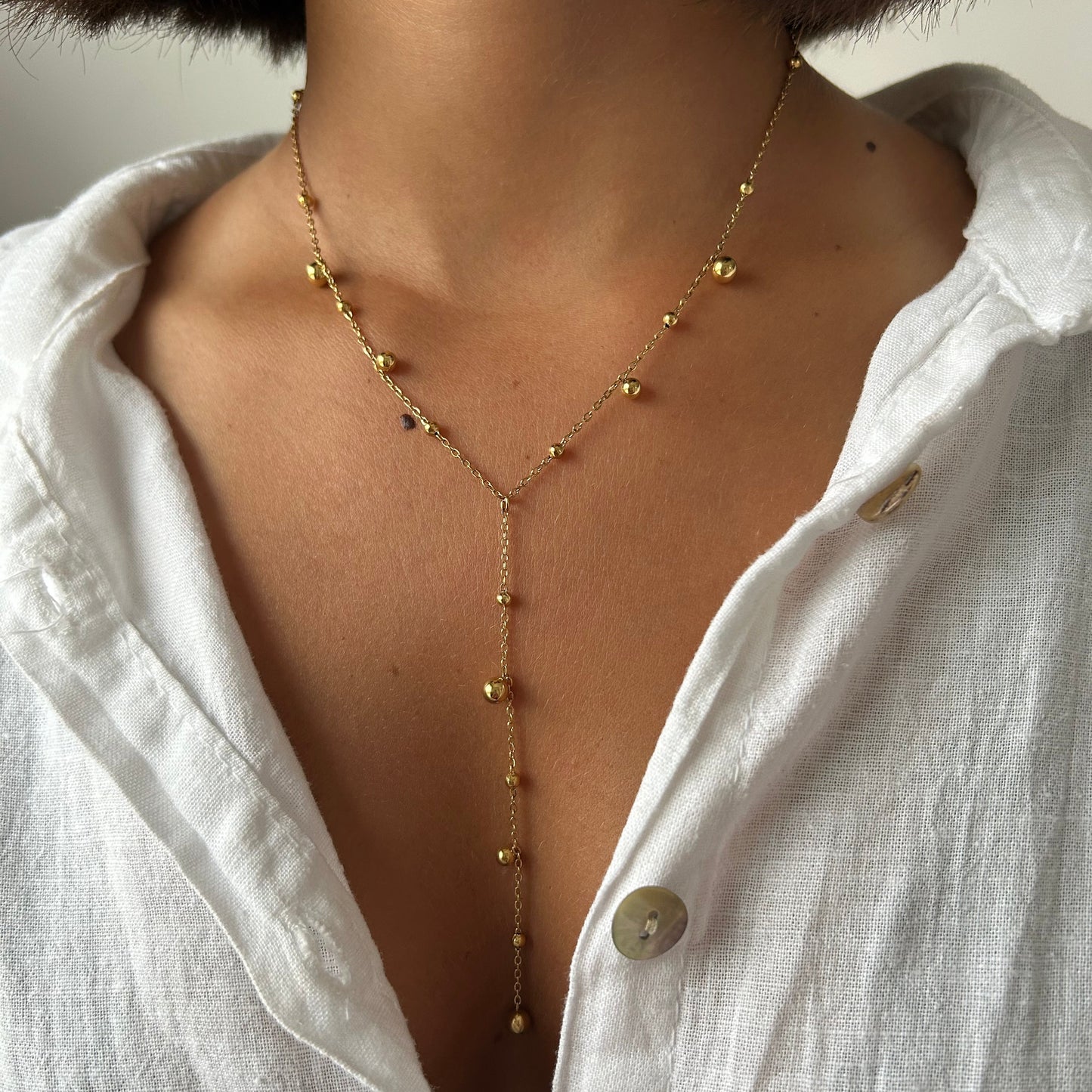 COLLIER LONG OLHO