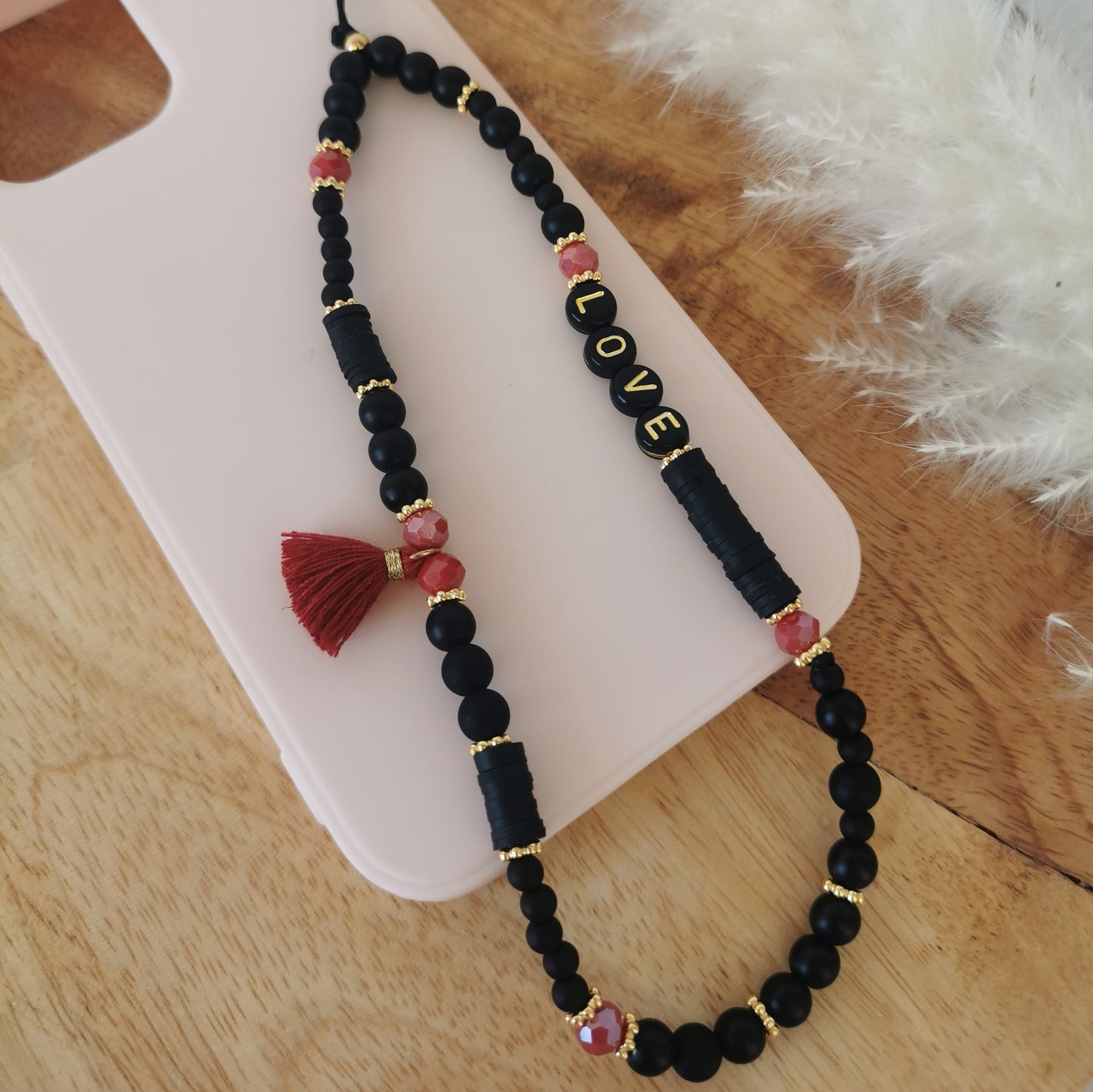 BIJOU DE TÉLÉPHONE - POMPON BORDEAUX