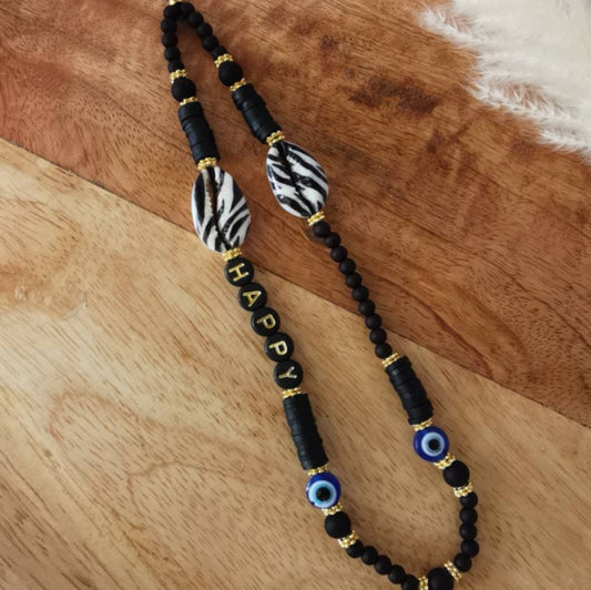 BIJOU DE TÉLÉPHONE - COQUILLAGE OEIL