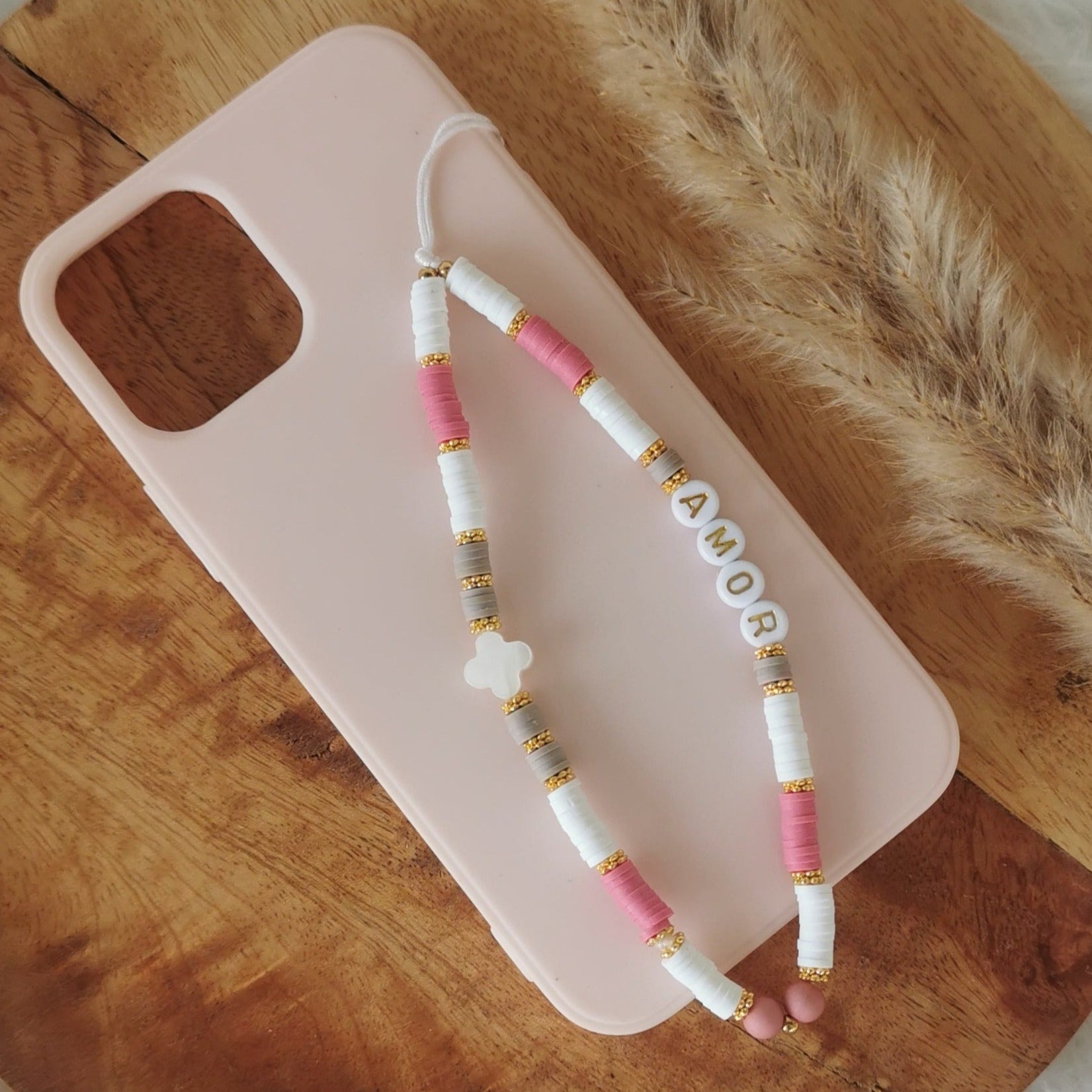 Grossiste accessoires smartphone, bijoux de téléphone rose plage